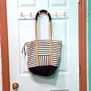 Navy blue, white-striped Spanish hand bag